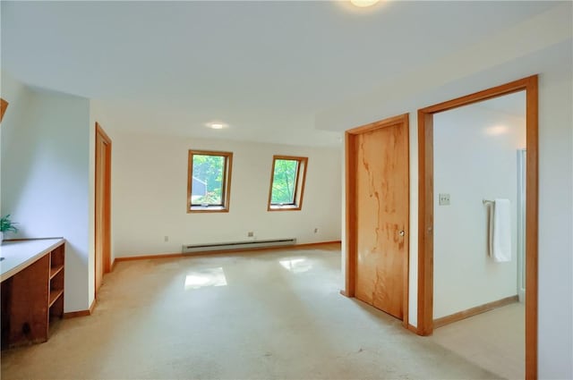113 S Heide Ln, Peters Twp, PA 15317 - unfurnished living room with a baseboard radiator and light colored carpet