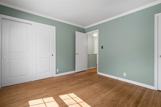 158 Jamestown Ct, Pittsburgh, PA 15216 - unfurnished bedroom featuring light wood-style floors, ornamental molding, and a closet