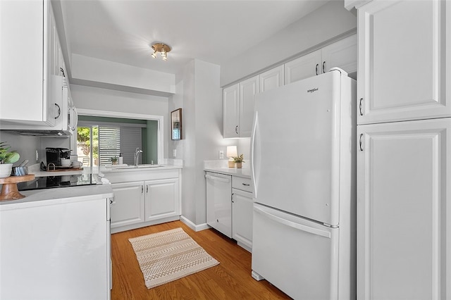 158 Jamestown Ct, Pittsburgh, PA 15216 - kitchen featuring white appliances, white cabinetry, light countertops, and light wood-style flooring