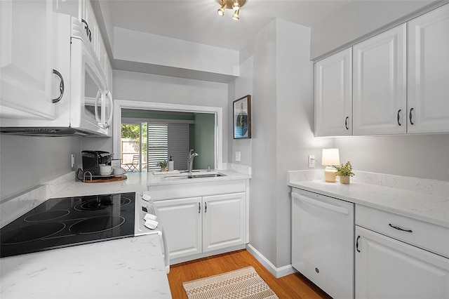 158 Jamestown Ct, Pittsburgh, PA 15216 - kitchen featuring white appliances, light wood-type flooring, white cabinets, and light stone counters