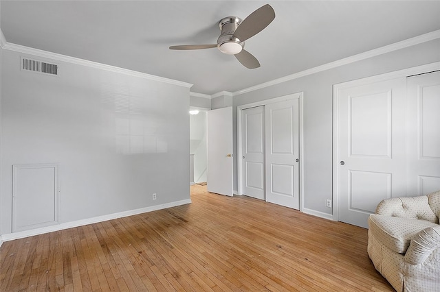 158 Jamestown Ct, Pittsburgh, PA 15216 - unfurnished bedroom with two closets, light wood finished floors, ornamental molding, and ceiling fan