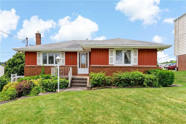 463 Thomas St, Monroeville, PA 15146 - view of front of home with brick siding, a chimney, board and batten siding, and a front lawn