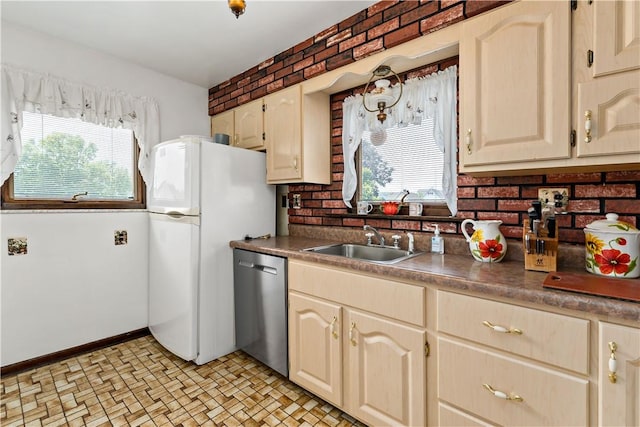 463 Thomas St, Monroeville, PA 15146 - kitchen featuring stainless steel dishwasher, decorative backsplash, freestanding refrigerator, and dark countertops