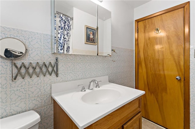463 Thomas St, Monroeville, PA 15146 - full bathroom with tile walls, vanity, and wainscoting