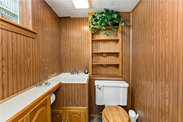 463 Thomas St, Monroeville, PA 15146 - bathroom featuring wood walls, vanity, and an ornate ceiling