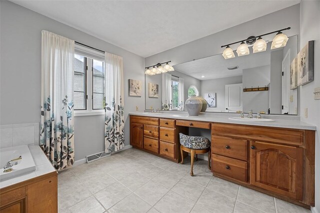 204 Pine Cone Ct, Pine Twp Nal, PA 15090 - bathroom featuring double vanity, plenty of natural light, a tub to relax in, and tile patterned flooring