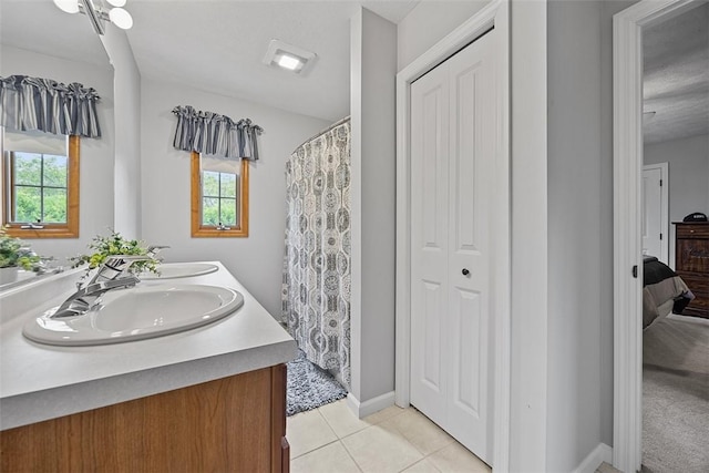 204 Pine Cone Ct, Pine Twp Nal, PA 15090 - full bath featuring a closet, double vanity, plenty of natural light, and tile patterned flooring