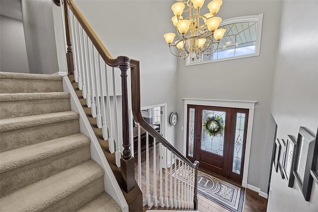 204 Pine Cone Ct, Pine Twp Nal, PA 15090 - foyer entrance featuring stairway, plenty of natural light, a chandelier, and a towering ceiling