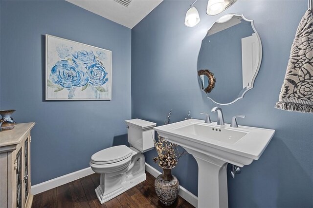 204 Pine Cone Ct, Pine Twp Nal, PA 15090 - bathroom featuring toilet and hardwood / wood-style floors