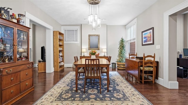 422 S Lang Ave, Point Breeze, PA 15208 - dining space featuring dark wood-style flooring and a chandelier