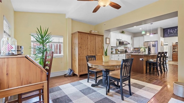422 S Lang Ave, Point Breeze, PA 15208 - dining room with ceiling fan and light wood-style floors
