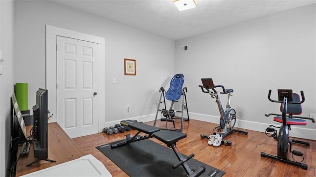 422 S Lang Ave, Point Breeze, PA 15208 - workout room with wood finished floors and baseboards