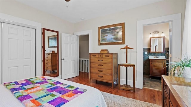 422 S Lang Ave, Point Breeze, PA 15208 - bedroom with dark wood finished floors, a closet, and connected bathroom