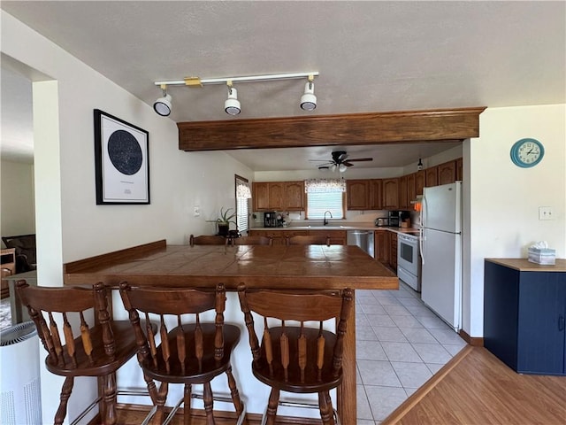 326 Aiken Rd, Shenango Twp Law, PA 16101 - dining area with ceiling fan and beam ceiling