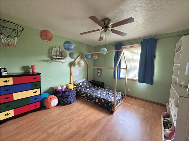326 Aiken Rd, Shenango Twp Law, PA 16101 - bedroom featuring wood finished floors, a ceiling fan, and a textured ceiling