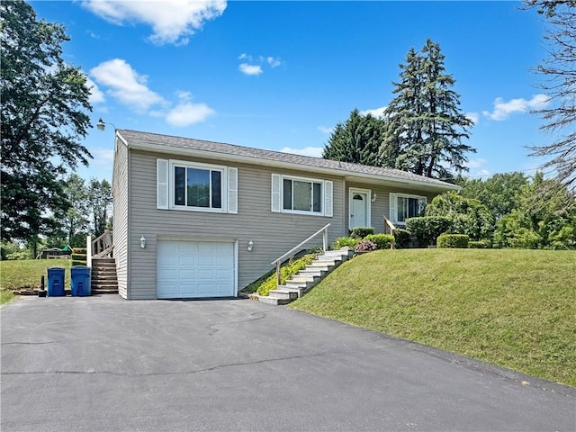 326 Aiken Rd, Shenango Twp Law, PA 16101 - ranch-style home with stairway, asphalt driveway, a front lawn, and an attached garage