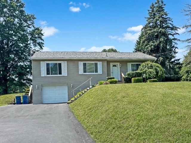 326 Aiken Rd, Shenango Twp Law, PA 16101 - ranch-style home featuring driveway, a front yard, an attached garage, and stairs