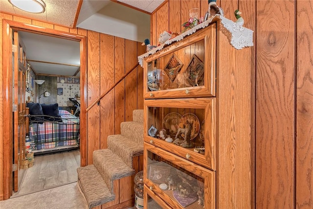 354 Moween Rd, Loyalhanna, PA 15681 - stairway featuring wood walls and wood finished floors