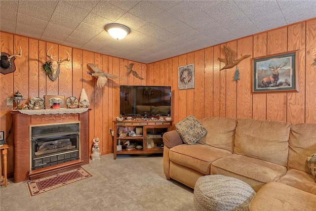 354 Moween Rd, Loyalhanna, PA 15681 - carpeted living area featuring wooden walls and a glass covered fireplace