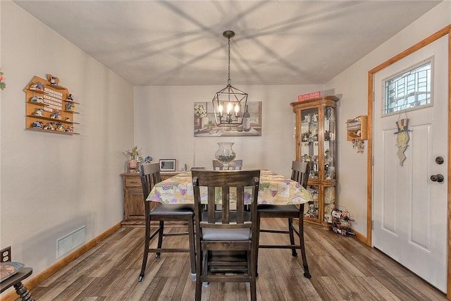 354 Moween Rd, Loyalhanna, PA 15681 - dining room featuring a chandelier and wood finished floors