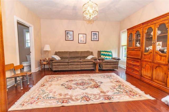 1010 Country Club Rd, Penn Twp Wml, PA 15644 - living room featuring wood finished floors and a chandelier