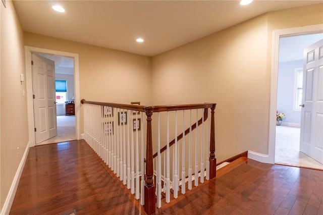1010 Country Club Rd, Penn Twp Wml, PA 15644 - corridor featuring hardwood / wood-style flooring, recessed lighting, and an upstairs landing