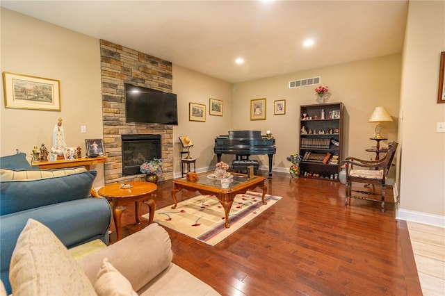 1010 Country Club Rd, Penn Twp Wml, PA 15644 - living room with hardwood / wood-style floors, recessed lighting, and a stone fireplace