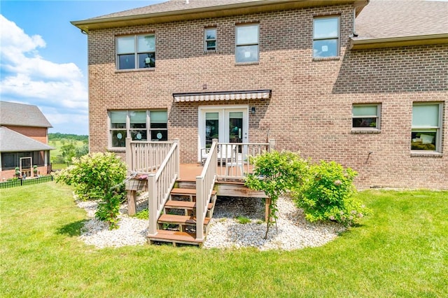 1010 Country Club Rd, Penn Twp Wml, PA 15644 - rear view of house featuring brick siding, a yard, a deck, and a shingled roof