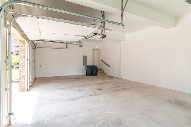 1010 Country Club Rd, Penn Twp Wml, PA 15644 - garage featuring a garage door opener and electric panel