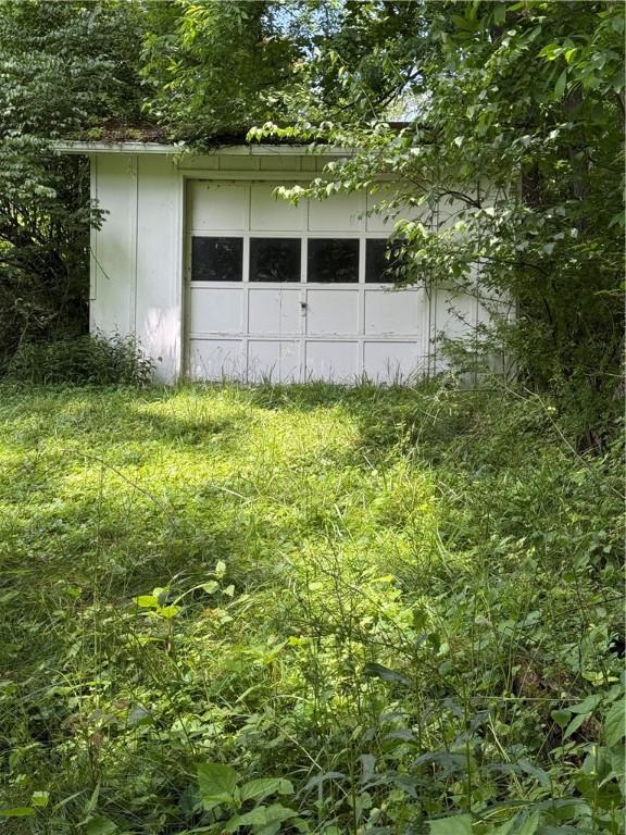 301 Hopper Rd, Delaware Twp, PA 16154 - garage with a storage unit
