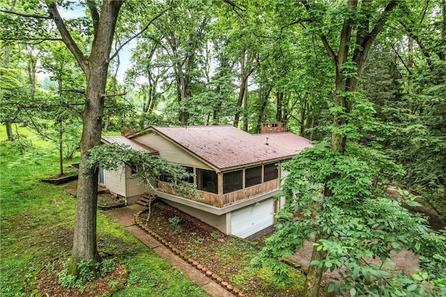 301 Hopper Rd, Delaware Twp, PA 16154 - back of property featuring a sunroom and a chimney