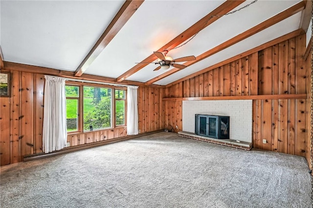 301 Hopper Rd, Delaware Twp, PA 16154 - unfurnished living room with wooden walls, carpet, a brick fireplace, a ceiling fan, and baseboard heating