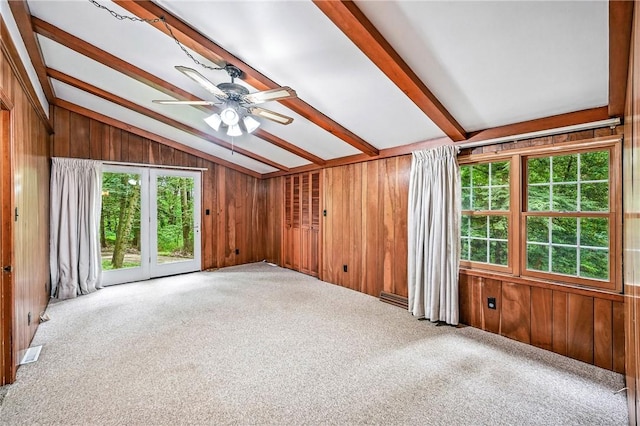 301 Hopper Rd, Delaware Twp, PA 16154 - carpeted spare room featuring wooden walls and a ceiling fan