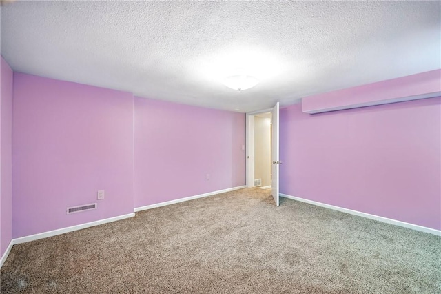 301 Hopper Rd, Delaware Twp, PA 16154 - carpeted empty room with a textured ceiling