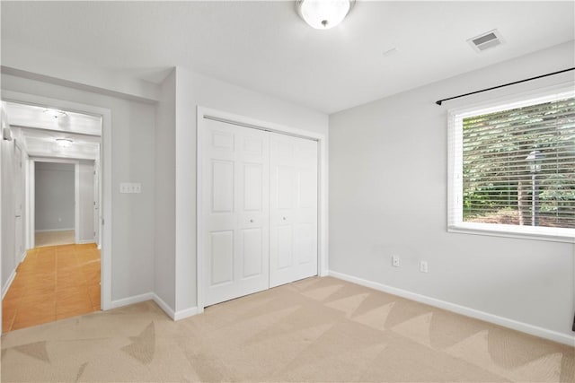 9404 Sundance Dr, South Fayette, PA 15017 - unfurnished bedroom with light colored carpet and a closet