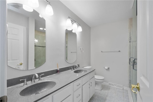 9404 Sundance Dr, South Fayette, PA 15017 - bathroom with double vanity, a stall shower, and tile patterned floors