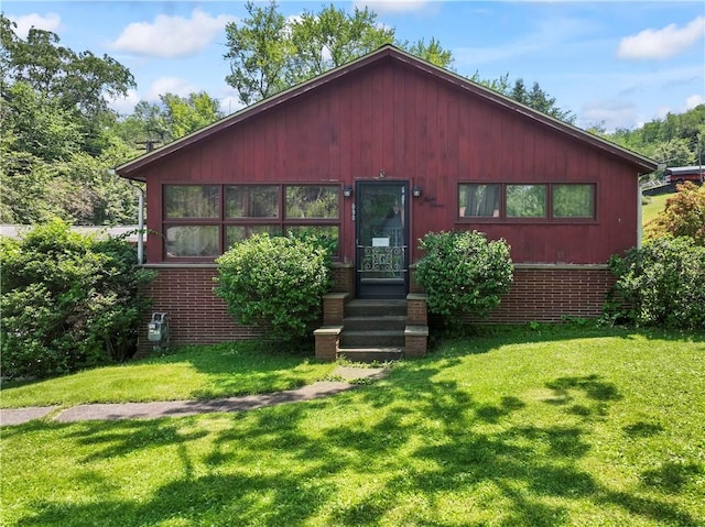 890 Deer Ln, Rochester Twp, PA 15074 - view of front of home featuring a front lawn and brick siding