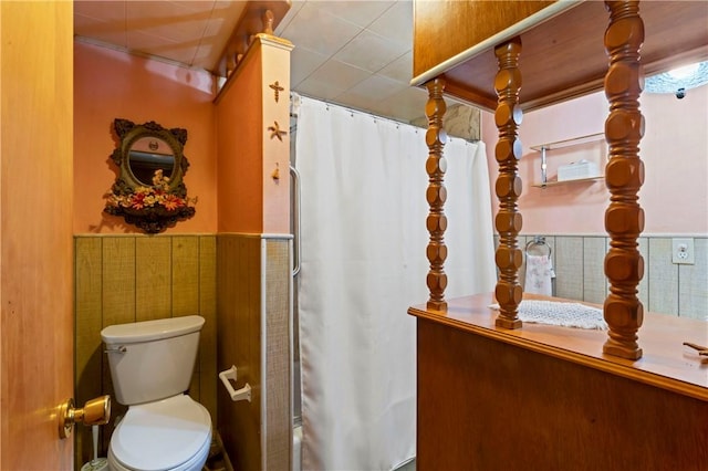 890 Deer Ln, Rochester Twp, PA 15074 - bathroom with curtained shower and wainscoting