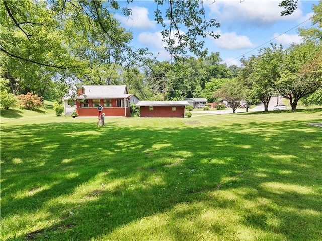 890 Deer Ln, Rochester Twp, PA 15074 - view of grassy yard with view of wooded area