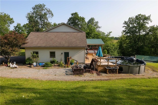 158 Snowdrift Rd, Nottingham, PA 15330 - rear view of property with a lawn and a wooden deck