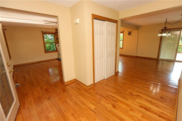 158 Snowdrift Rd, Nottingham, PA 15330 - spare room featuring light wood finished floors and a chandelier