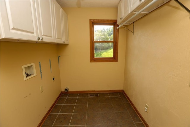 158 Snowdrift Rd, Nottingham, PA 15330 - laundry area with cabinet space, electric dryer hookup, hookup for a washing machine, and dark tile patterned flooring