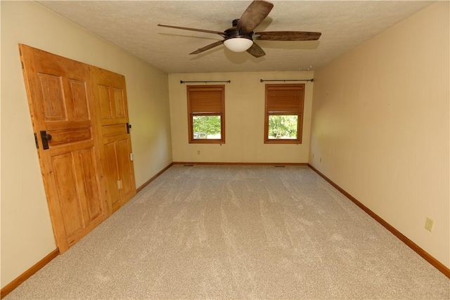158 Snowdrift Rd, Nottingham, PA 15330 - spare room with ceiling fan, light colored carpet, and a textured ceiling