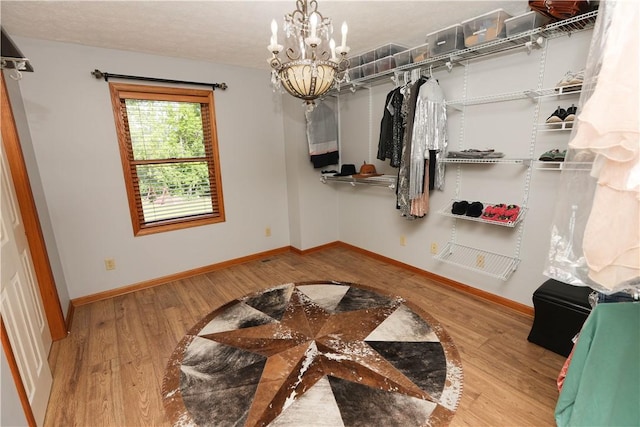 158 Snowdrift Rd, Nottingham, PA 15330 - walk in closet featuring wood finished floors and a chandelier