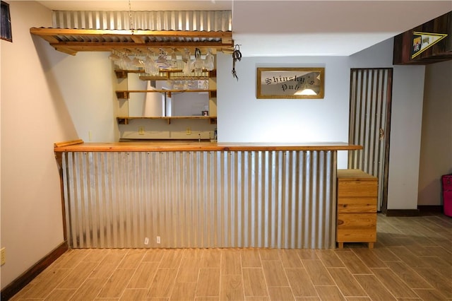 158 Snowdrift Rd, Nottingham, PA 15330 - indoor wet bar with baseboards and wood tiled floors