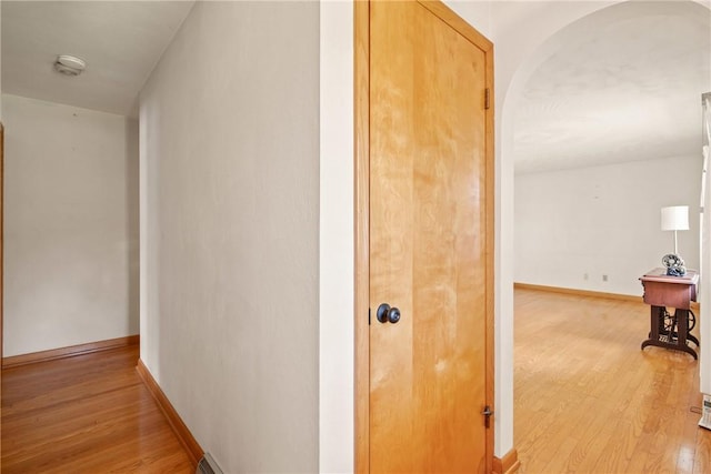 2345 Stoystown Rd, Somerset Twp, PA 15541 - hallway featuring light wood-style flooring and arched walkways