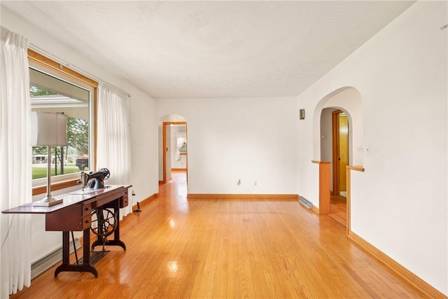 2345 Stoystown Rd, Somerset Twp, PA 15541 - spare room with arched walkways and light wood-type flooring