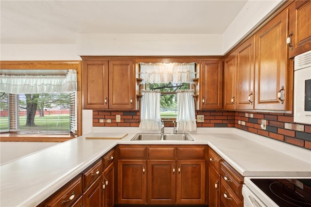 2345 Stoystown Rd, Somerset Twp, PA 15541 - kitchen with open shelves, healthy amount of natural light, light countertops, and tasteful backsplash