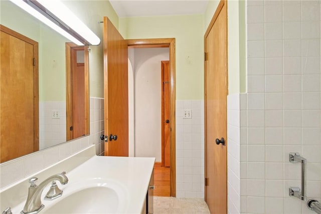 2345 Stoystown Rd, Somerset Twp, PA 15541 - bathroom with tile walls, vanity, and wainscoting