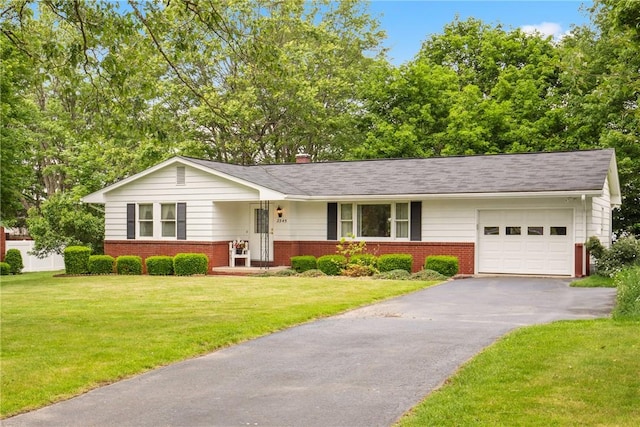 2345 Stoystown Rd, Somerset Twp, PA 15541 - view of front of property featuring brick siding, an attached garage, asphalt driveway, and a front yard